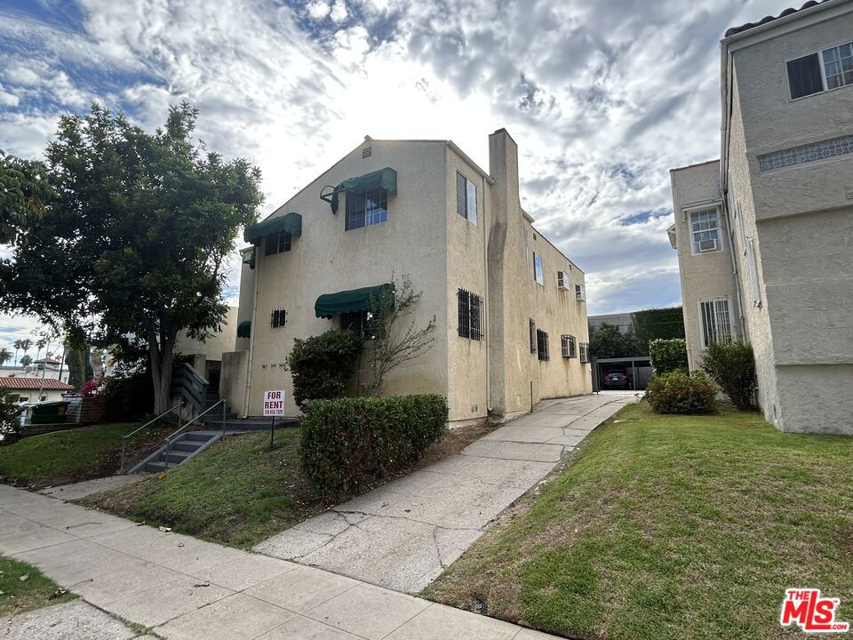Upgraded triplex with one vacancy (and another one effective 1-4-26) in highly sought-after Mid Wilshire area. Completely remodeled, vacant 3 bedroom 3 bath lower unit with new central air and heating, very large formal dining room, living room with fireplace, new kitchen with granite counter tops, new cabinets, stove, microwave and dishwasher, breakfast area and laundry area for stacked washer and dryer. All 3 bathrooms are remodeled and 2 of them are on suite. 1 covered parking spaces and 2 uncovered for the 3 bedroom apartment. The other 2 one bedroom one bath apartment tenants have 1 covered parking space each. One of the 1 bedroom units is Section 8 and HACLA has given seller notice of the unit being vacated in January. Perfect acquisition for owner-occupant or investor. Upstairs are 2 one bedroom apartments and downstairs is the vacant, renovated 3 bed 3 bath. Tours of downstairs vacant unit can be scheduled with listing agent. The 6,457 SF lot and R2 zoning (and no HPOZ) provides a rare opportunity to add an ADU (buyer to verify). Situated just 3 blocks (0.3 mile and 7 minutes walk) from future D Line light rail station at Wilshire and La Brea, connecting Downtown L.A. / Mid-Wilshire / K-Town to Beverly Hills and Westwood! Station slated to open Fall 2025!