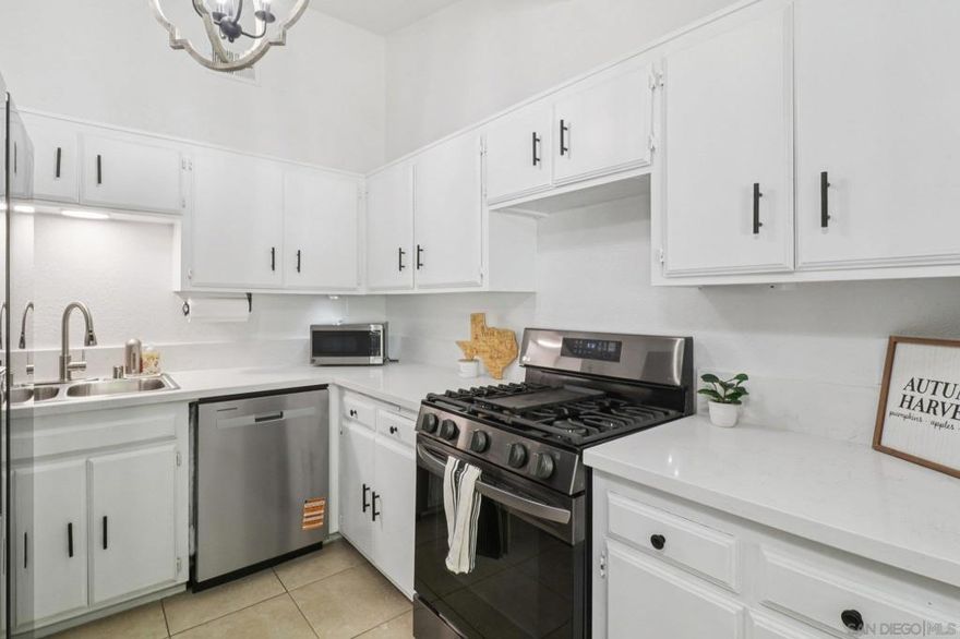 Welcome to Casa Del Sol Estates! Move-in ready 4BR/2BA townhome with approx. 1,497 sq. ft. Features include a downstairs bedroom with walk-in closet, updated HVAC, fresh paint, newer carpet, dual-pane windows & modern fixtures. Kitchen offers a 5-burner stove, gas oven, new dishwasher, new countertop & refrigerator. Enjoy solar panels with battery backup, providing energy efficiency & peace of mind. Attached 2-car garage with laundry hookups plus 1 extra parking space. Private fenced patio opens to a greenbelt. HOA amenities: pool, picnic area, RV parking & landscaped common areas. Convenient Lakeside location close to shopping, dining, Lindo Lake & freeway access.