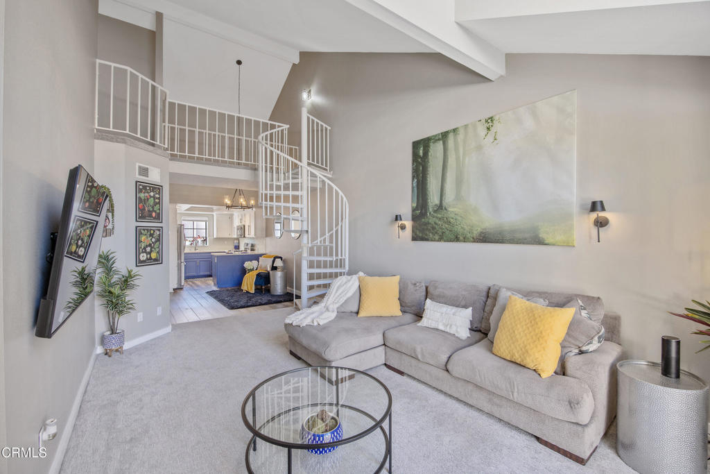Welcome home to this move-in ready two bedroom (with loft/flex space) and two full bathroom condo in the Princessa Estates. This light-filled home features a bright and open floor plan with soaring cathedral ceilings and a versatile loft, perfect for a home office, guest space, or 3rd bedroom, the possibilities are endless!The beautifully updated kitchen features new countertops, backsplash, recessed lighting, fresh paint and stainless steel appliances. Enjoy the warmth of an updated fireplace, complemented by new flooring, base molding, and modern lighting fixtures throughout. Both bathrooms have been thoughtfully renovated with new vanities, flooring, and toilets, adding a fresh, contemporary touch. The guest bedroom includes new closet doors, while the primary suite features vaulted ceilings for a spacious, airy feel! Step outside to multiple greenbelts as well as enjoy community amenities and 2 sparkling pools!Unit has a tandem two car garage with easy access to your unit. Featuring a new garage door. And washer & dryer as well as all appliances are included!Located in a highly convenient, commuter-friendly spot, less than 1/4 mile from the 14 Freeway, and easy access to local shops and restaurants.This home truly combines modern upgrades, thoughtful design, and everyday convenience--making it the perfect place to call HOME!