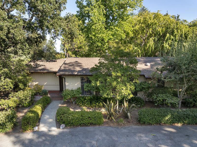 Build your dream home at the top of Atherton Avenue on 1-acre. Presently there is the 3 bedroom 2-bath home with attached 2 Bedroom, 2 bath guest house.
