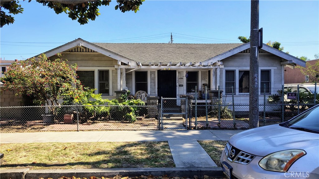 You’ve heard of “RESIDUAL INCOME”—now here’s your chance to see it in action | Unlock the possibilities with this existing Single-Family-Home that is ideally situated on a generously sized lot (9,846 sq ft) with ADU or multi-unit potential (Zoned for DUPLEX - buyer to verify with city) | Whether you're an investor, builder, or homeowner looking to expand, this property offers a rare opportunity to maximize value and create a stream of income | With ample space for additional units or an accessory dwelling unit, the lot presents a blank canvas for future growth | The existing home is not FHA compliant for financing due to its deferred maintenance | However, this property can provide a long-term upside if you put the time and effort | THIS PROPERTY IS BEING SOLD TOGETHER WITH THE ADJACENT LAND PARCEL, IN WHICH IS OFFERED AT A SEPERATE SALE PRICE. FOR COMPLETE DETAILS, PLEASE REFER TO ASSESOR'S PARCEL #7431-029-006.