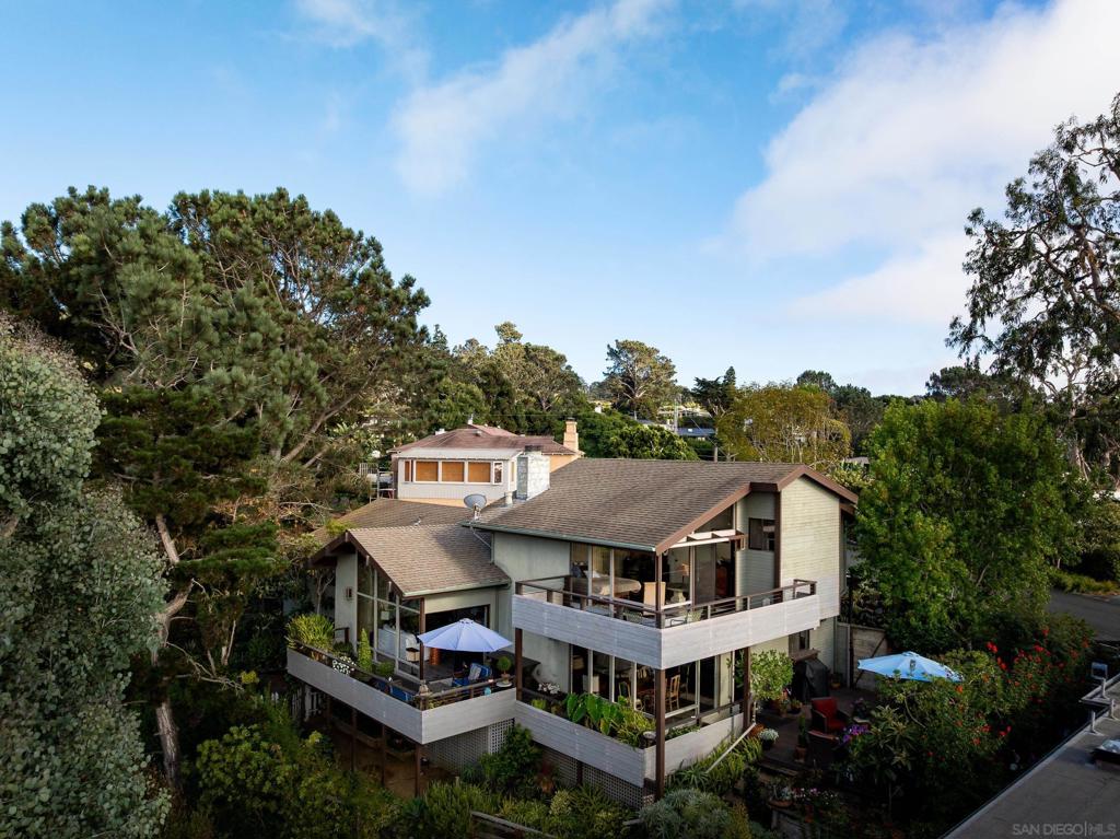 FIRST TIME ON THE MARKET! An Olde Del Mar classic in wood and glass by architect Donald G. Cook offers an array of amazing opportunities. Nestled amidst a beautiful seaside canyon with fantastic ocean views and refreshing Pacific breezes, the Cook Residence is a rare legacy property that exemplifies the unique history of the best neighborhood in all of San Diego County. Enjoy the surrounding natural beauty from patios and deck spaces. This quiet, private property is just a short walk to all that the Village has to offer.