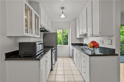 Photo of 5055 Coldwater Canyon AVE #217, Sherman Oaks, CA 91423 (MLS # SR26099912)