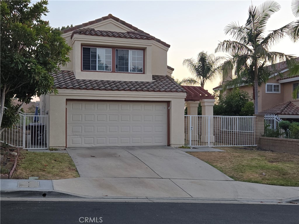 A detached home in a great location in Anaheim Hills near Serrano (Canyon Vista) and Weir Canyon. Close to shopping centers, schools, freeways, parks, banks, walking trails, etc. Front entry to a bright living room with high ceiling. Turn left from the entry to a family room with a cozy fireplace and 1/2 bathroom next to it. All 4 bedrooms are upstairs. One full bath near the hallway and one full bath in the master bedroom. Master bedroom has a walk-in closet and dual sinks. One year old carpets, custom made zebra blinds and microwave oven over the range. Very nice hill breeze in the summertime.