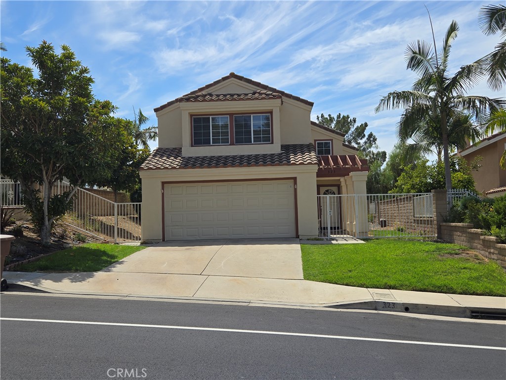 A detached home in a great location in Anaheim Hills near Serrano (Canyon Vista) and Weir Canyon. Close to shopping centers, schools, freeways, parks, banks, walking trails, etc. Front entry to a bright living room with high ceiling. Turn left from the entry to a family room with a cozy fireplace and 1/2 bathroom next to it. All 4 bedrooms are upstairs. One full bath near the hallway and one full bath in the master bedroom. Master bedroom has a walk-in closet and dual sinks. One year old carpets, custom made zebra blinds and microwave oven over the range. Very nice hill breeze in the summertime.