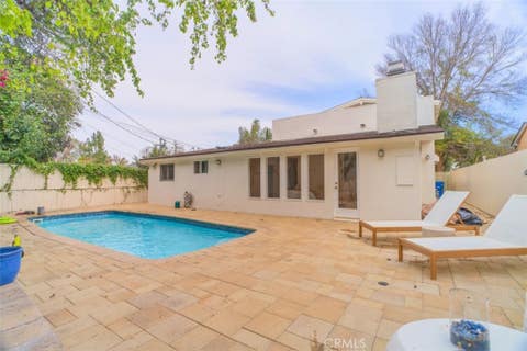Photo of 5179 Canoga Ave AVE, Woodland Hills, CA 91364 (MLS # GD26146707)