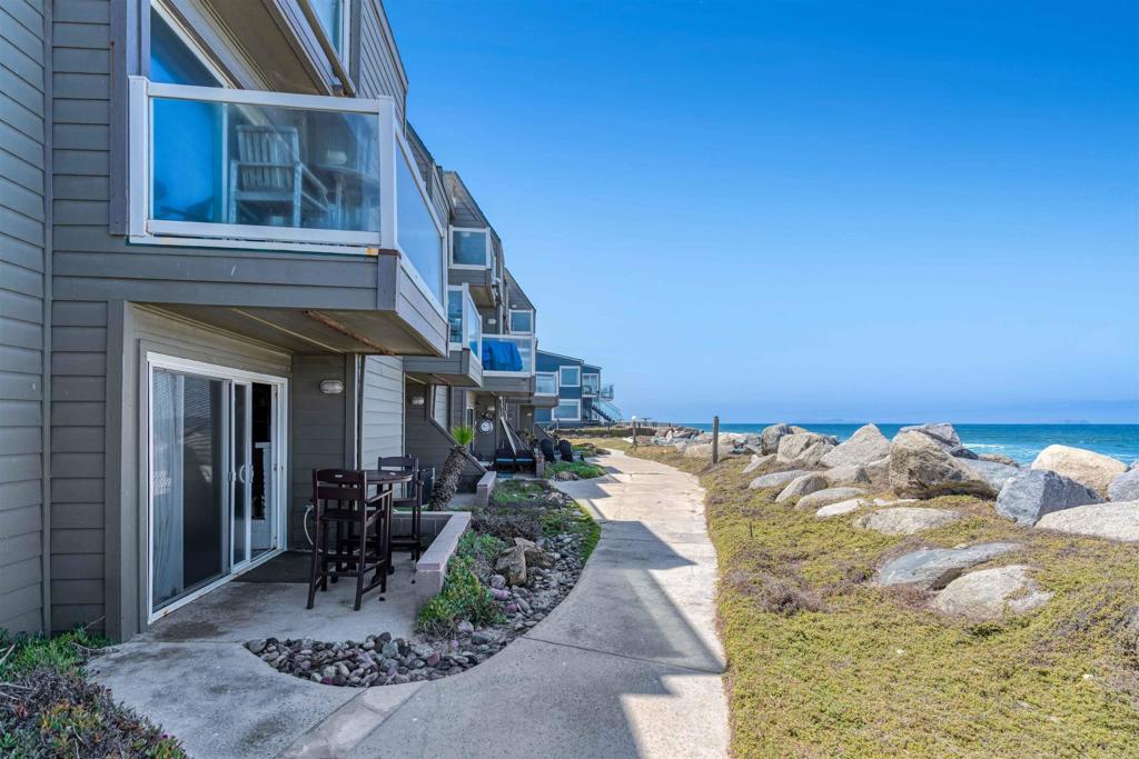 I’m Welcome to 1502 Seacoast Dr, a rare beachfront 2-bedroom, 2-bath first-floor condo in the heart of Imperial Beach. This spacious unit features two private oceanfront balconies with direct sand access—perfect for relaxing, entertaining, or enjoying daily sunsets. The open-concept living area is filled with natural light, and the updated kitchen offers ample cabinet space. Both bedrooms are generously sized, with the primary suite featuring an en-suite bathroom and direct balcony access. Additional highlights include in-unit laundry and a private detached garage for secure parking and storage. The property can be leased furnished or unfurnished, offering flexible living options. Ideally located just steps from the pier, dining, and shopping. Very easy to show—email sarabiapropertiesllc@gmail.com or call (619) 321-7344 to schedule a private tour.