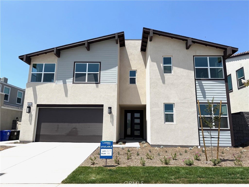 Spacious NEW two-story design offering an array of premier features. This home features 5 bedrooms and Loft with 4.5 baths and a 3-car tandem garage. This beautiful home includes upgraded features such as black handles on white cabinetry, quartz countertops, luxury vinyl plank flooring on the main floor and more! The Wildstar community is a gated community with contemporary amenity that includes a pool, jacuzzi, lounge areas, a dog park and also a pickleball court. Don't miss the opportunity! Home ready for move-in.