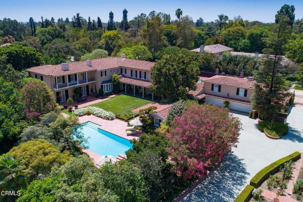 Architectural Masterpiece Estate Designed By Kirkland Cutter in 1929 For Walden Shaw, a car dealer from Chicago who started the Yellow Cab Company. Replicating the classic lines of the first California State House in Monterey and located in the prestigious Estate Area of Pasadena overlooking the Huntington Library and Botanical Gardens. The next owner was Henry Braun, The CEO of C F Braun & CO., a global leader in engineering and construction of refineries and chemical plants. The next owner was Orel Hershiser. Orel was the three time all-star pitcher for the Dodgers, one of the most successful pitchers of all time. Situated on 1.72 acres of manicured grounds. The grounds include a lighted north south tennis court, putting green, pool spa and rose garden. The main residence measures 9,670 (approx.) square feet of beautifully appointed grand spaces. Upstairs there is a master suite with duel dressing rooms and baths. There are 3 additional bedrooms. A four car garage is steps from the kitchen. There is also a guest house with 823 (approx.) square feet and its own garage, A pool house with 445 sf (approx.) and caretakers apartment with 917 sf (approx.) are included. The property is gated and upgraded with a 400 amp electrical service. A truly unique opportunity to have one of Pasadena's finest estates with every amenity one could desire.