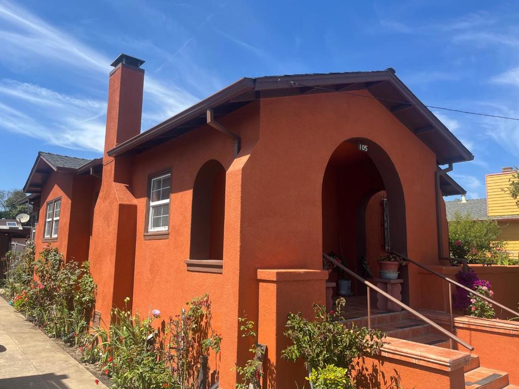 Welcome to this charming 3-bedroom, 1.5 -bathroom home located in the vibrant city of Watsonville. With 1,085 sq ft of living space on a 3,877 sq ft lot, this property offers a cozy and functional layout. The kitchen features a tiled countertop, gas oven range, refrigerator, and exhaust fan, perfect for all your culinary needs. The detached single car garage has a permitted utility/laundry room equipped with 220V electricity, a toilet and a tub/sink. The flooring is a combination of hardwood, carpet and tile, providing both comfort and style throughout the home. Two gas wall furnace provide warmth during cooler months. Relax in the dining area, and unwind by the fireplace on chilly evenings. This property is part of the Pajaro Valley Unified School District. Easy access to downtown and nearby Callaghan Park, this home is both practical and inviting, ready to accommodate your lifestyle needs.