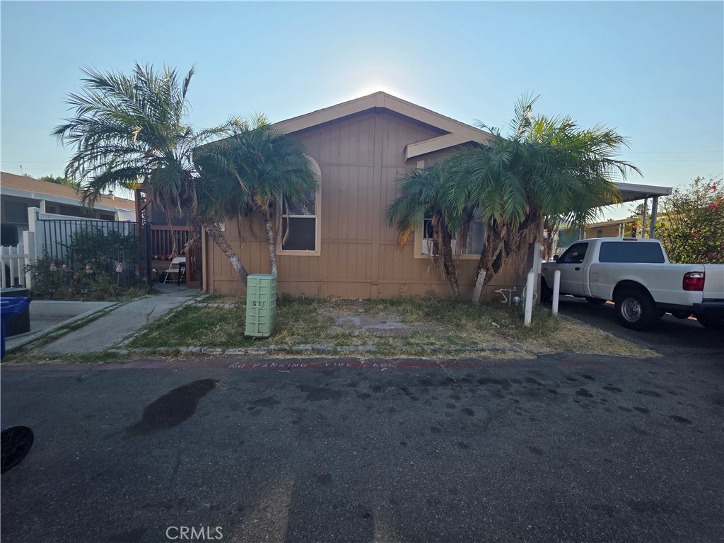 Welcome to this beautifully maintained 4-bedroom, 2-bathroom manufactured home located in the heart of El Cajon. Built in 1991 and offering 1,316 sq. ft. of comfortable living space, this home boasts a bright and open floor plan with a vaulted ceiling and skylight in the living room, creating a spacious and inviting atmosphere.
Enjoy upgraded flooring throughout the home, modern fixtures in both bathrooms, and a separate den or office space—perfect for remote work or a cozy reading nook. The individual laundry room inside the unit adds convenience and functionality.
Outside, you'll find a nicely sized side yard ideal for outdoor relaxation or entertaining, as well as a two-car tandem carport for easy parking.
Located in an all-age community with fantastic amenities including a clubhouse for events, swimming pool, and a convenient on-site laundromat. Don’t miss this opportunity to own a home in a friendly and well-kept neighborhood!