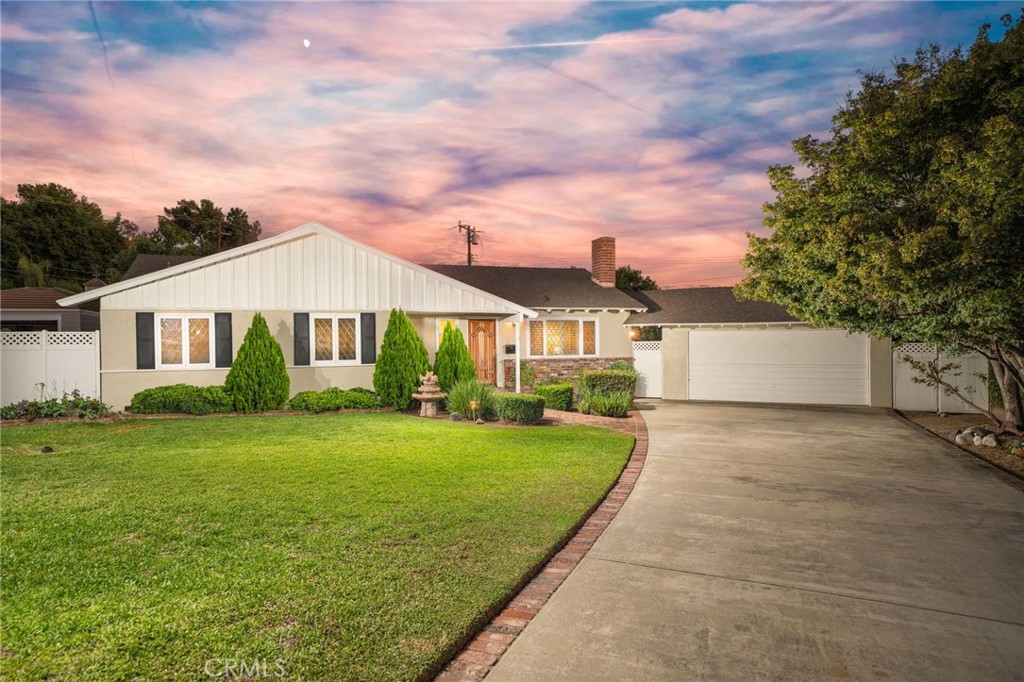 Tucked away at the end of a peaceful cul-de-sac in a desirable North Glendora neighborhood, this beautifully updated home offers comfort, charm, and convenience. With 3 bedrooms, 2 bathrooms, and 1,507 sq ft of living space on a generous 12,351 sq ft lot, this property is perfect for those seeking both privacy and a functional layout. Step onto the inviting brick front porch and into a warm living room featuring beveled front windows with plantation shutters, a cozy fireplace, and custom built-in bookshelves and cabinets. The heart of the home is the open-concept kitchen, boasting white cabinetry, a center island, granite countertops, stylish glass backsplash, and stainless steel appliances including a built-in refrigerator, gas cooktop, double ovens, and a spacious walk-in pantry. Adjacent to the kitchen, the light-filled family room includes a second fireplace, a large closet, and French doors that open to the backyard oasis. All three bedrooms are generously sized and offer new carpet and mirrored closet doors. Two well-appointed hallway bathrooms include a shower/tub combo in one and a standalone shower in the other. Thoughtful upgrades throughout the home include fresh interior paint, new luxury vinyl flooring, new carpet in the bedrooms, new baseboards, recessed lighting, PEX plumbing, new waste line, Milgard dual-pane windows, and an updated electrical panel. Enjoy California living in the expansive backyard featuring an in-ground pool and spa, large pool deck, spacious lawn area, and mature fruit trees, ideal for relaxing or entertaining. The two-car garage with breezeway includes laundry facilities and extra storage. Located in the highly rated Glendora Unified School District, this home is within walking distance to Cullen Elementary, Goddard Middle School, and the charming downtown Glendora Village with its array of shops, restaurants, and cafes.
Don’t miss this rare opportunity to own a turnkey home in a sought-after location!
