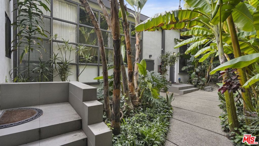 Introducing 1007-1011 N San Vicente Blvd, a coveted four-unit income property nestled in the vibrant heart of West Hollywood, just steps from the renowned Sunset Strip. The largest unit of this property is thoughtfully designed with three bedrooms and three bathrooms. This unit offers a spacious layout with soaring ceilings, a gracious great room, dining area, living space, and a private patio. There are two individual two-bedroom townhomes, each featuring open layouts, ample natural light, and hardwood flooring throughout. Additionally, a cozy one-bedroom loft awaits, boasting high ceilings and a skylight that illuminates the space with warmth and tranquility. The property features a lush tropical courtyard oasis, creating a serene atmosphere. Enjoy the lively surroundings or find solace in the Zen-like ambiance, a true retreat from the bustling city life. In the heart of West Hollywood's iconic neighborhood this property presents an investment opportunity filled with promise. Explore the potential and discover the value waiting to be unlocked within these walls.