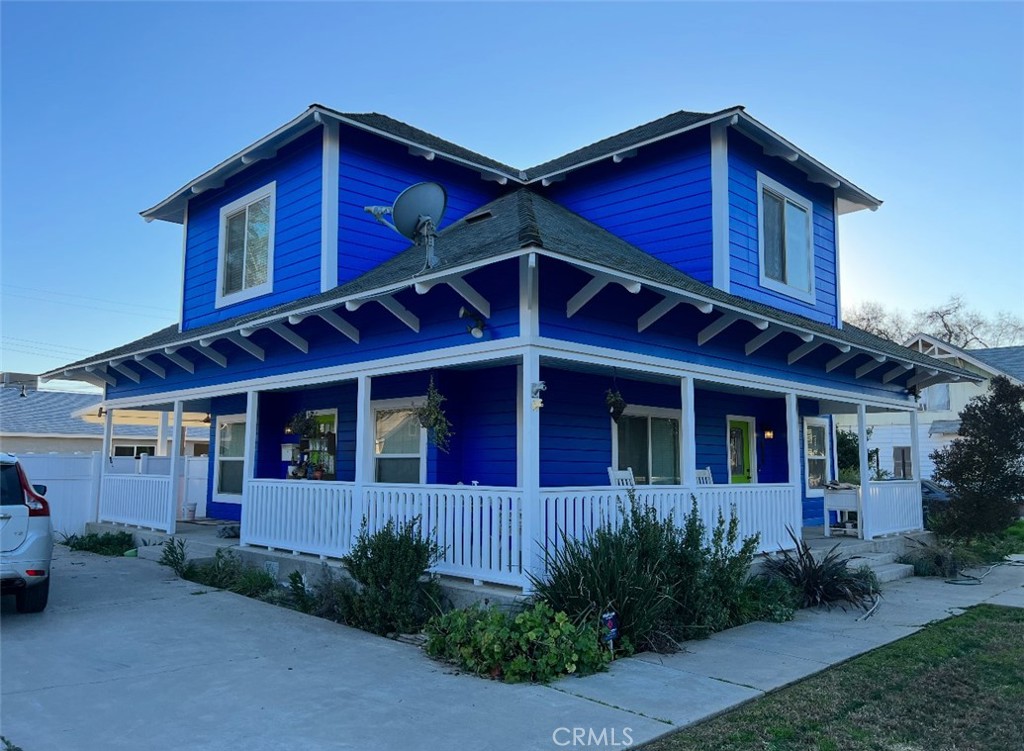 Welcome to this beautifully maintained Craftsman-style home nestled in a charming, established neighborhood in the heart of downtown Lemoore. From the inviting wraparound front porch to the thoughtful layout inside, this two-story home blends timeless character with modern convenience.
Downstairs, you’ll find a spacious living room, dining area, full bathroom, and a well-appointed kitchen featuring stainless steel appliances. Upstairs offers three generously sized bedrooms—each with its own walk-in closet—plus a second bathroom and a cozy loft space perfect for a reading nook, home office, or play area. You'll love the abundant storage throughout and the convenience of an indoor laundry room with washer and dryer included.
Enjoy low energy costs with owned solar, and step outside to a backyard designed for relaxing and entertaining—complete with a large covered patio and a dedicated dog run. This is a rare opportunity to own a character-filled home in a sought-after location with thoughtful updates and plenty of space to grow.