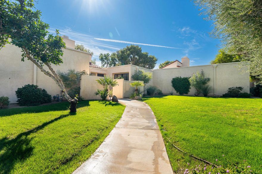 This lovely 3 bedroom, 3 bath residence in Mission Hills Country Club awaits your transformation and personal touches. The home offers a spacious open concept living and dining area with the original wooden cathedral ceiling creating a natural mid-century architectural ambience. With a panoramic southern view of the swimming pool and an open green space area, the home offers bright interiors with natural lighting throughout the day. It also has partial mountain views. The dual zone, natural gas HVAC systems enable you to better control your indoor environment, and the home also has 2 newer hot water heaters. The home also comes with a 2 car, detached garage. Mission Hills Country Club offers a variety of memberships for your enjoyment including social, fitness and golf. Centrally located halfway between Palm Springs and Palm Desert, you have access to the fine dining, shopping and amenities of both communities, including the fabulous El Paseo shopping strip in Palm Desert featuring world recognized brand names. It's also only 5 minutes away from the highly regarded Eisenhower Medical Center offering exceptional medical care.  Best of all, the land lease has been extended to 2121.