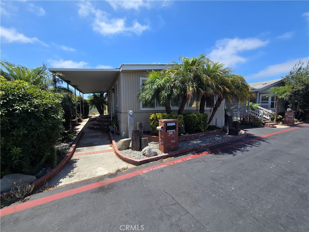 Welcome to Rancho Del Rey, one of Huntington Beach’s premier 55+ gated communities, just minutes from the coast! This spacious 2-bedroom, 2-bathroom manufactured home offers a fantastic opportunity for buyers looking to customize and create their dream beach-close retreat. Located on a quiet interior lot in the park, this property features an open floor plan, generously sized living and dining areas, and a large kitchen with ample cabinetry. The primary suite includes an en-suite bath and walk-in closet, while the secondary bedroom is ideal for guests or a home office. Additional highlights include indoor laundry, covered parking, storage shed, and a private covered patio. Rancho Del Rey offers resort-style amenities: pool, spa, clubhouse, fitness center, billiards, and active social events. This is a probate sale and will be sold as-is, no court confirmation. Buyers to verify all information and complete due diligence on space rent and community requirements. Don’t miss this rare opportunity to live near the beach in a well-maintained 55+ community!