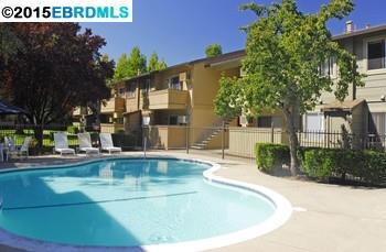 Nicely updated two story 2 bedroom 1.5 bath unit that is ready for any buyer to move in. High ceiling in the bedrooms, balcony from the dining area, extra storage outside, and assigned parking space in addition to permitted gusts parking. Close to Downtown, Bart, shopping,& schools.