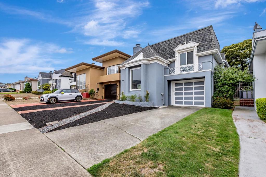 Welcome to this lovely 3-bedroom, 2-bathroom home nestled in the vibrant city of Daly City. Spanning 1,610 square feet, this residence offers a comfortable layout with a primary suite that provides a serene retreat. The kitchen is a focal point, perfect for preparing meals and entertaining. Enjoy meals in the dining area, which flows seamlessly into the living space. The home features beautiful wood flooring, adding warmth and elegance throughout. A cozy fireplace enhances the living area, creating a welcoming ambiance for gatherings or quiet evenings. Practicality is a priority with laundry conveniently located in the garage, which also offers two parking spaces. Located in the Jefferson Elementary School District, this home is ideal for those seeking a great location in Daly City. This residence is a true gem, providing a harmonious blend of comfort and convenience.