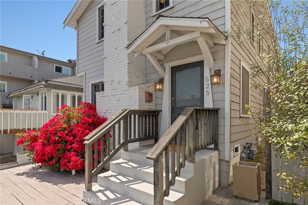 Incredible opportunity, unlimited character and endless potential all packed into this ultra-charming, craftsman beach home right at the front doorstep of Downtown Manhattan Beach! Literally the last single family home as you enter into DTMB where all the action, shops, bars, restaurants & boutiques greet you with a crystal blue ocean glisten cascading as your backdrop.
An extremely rare find, this 2-level storybook home embraces a vintage beachy feel and lifestyle… a throwback to the classic beach days of yesteryear, you can cancel your uber & doordash accounts and lock up your car keys… just grab a pair of flip-flops and literally everything you could ever want/need is right out your front door. A few blocks to the sand, strand & pier and everything in between… from Shellback & StrandHouse to The Kettle, up to Shade MB and the greenbelt, your entire world just got compressed into a 10 minute stroll. After a long day of sun & salt, “wine down” in the sanctuary, private backyard patio space… perfect indoor/outdoor flow from the rear family room that offers a great setting for entertaining or just a quiet retreat of relaxation. Situated on a sizable sand section 30x100 lot with broad zoning, you can also enjoy endless long-term potential with a variety of creative build and re-purpose options. Surrounded by the best schools in the South Bay (just blocks to Martyr’s or Pacific and a stones-throw to MBMS, Mira Costa) Conveniently just minutes to LAX and 105/405 fwys. Priced to sell .. don't miss your chance on this one!