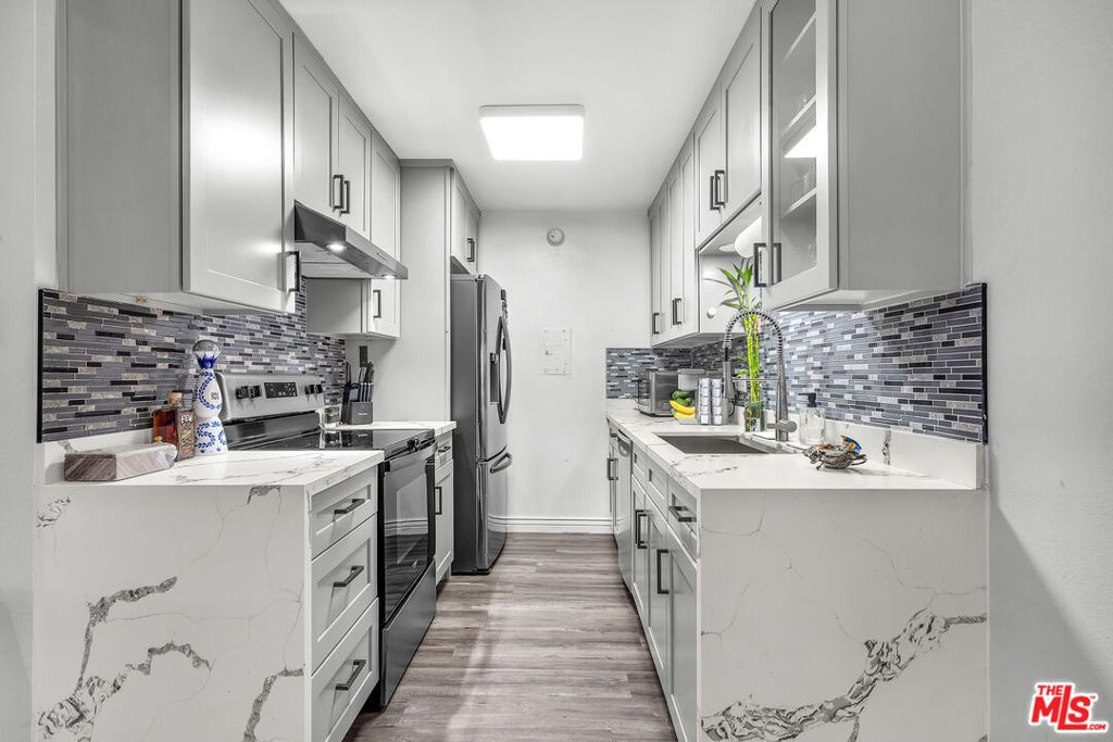 Photo of 5460 White Oak Avenue #D309, Encino, CA 91316 (MLS # 25609121)