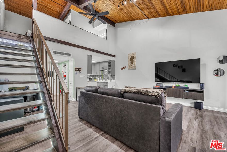 3,875 % FHA ASSUMABLDE LOAN      OF ABOUT $215,000... MAJOR SAVING FOR THE BUYERS....                       Beautifully updated top floor unit with open loft bedroom suite. Turnkey, totally remodeled in a resort like complex with 3 tennis courts, pool, 24-hour security. In prime Encino area, with easy access to Ventura Blvd and the 101 freeway, 2 parking spaces.                                                                              Assumable FHA loan @3.875% interest rate of about $215,000 (26 years remaining) to extremely well qualified buyer. A GREAT PLACE TO CALL HOME.