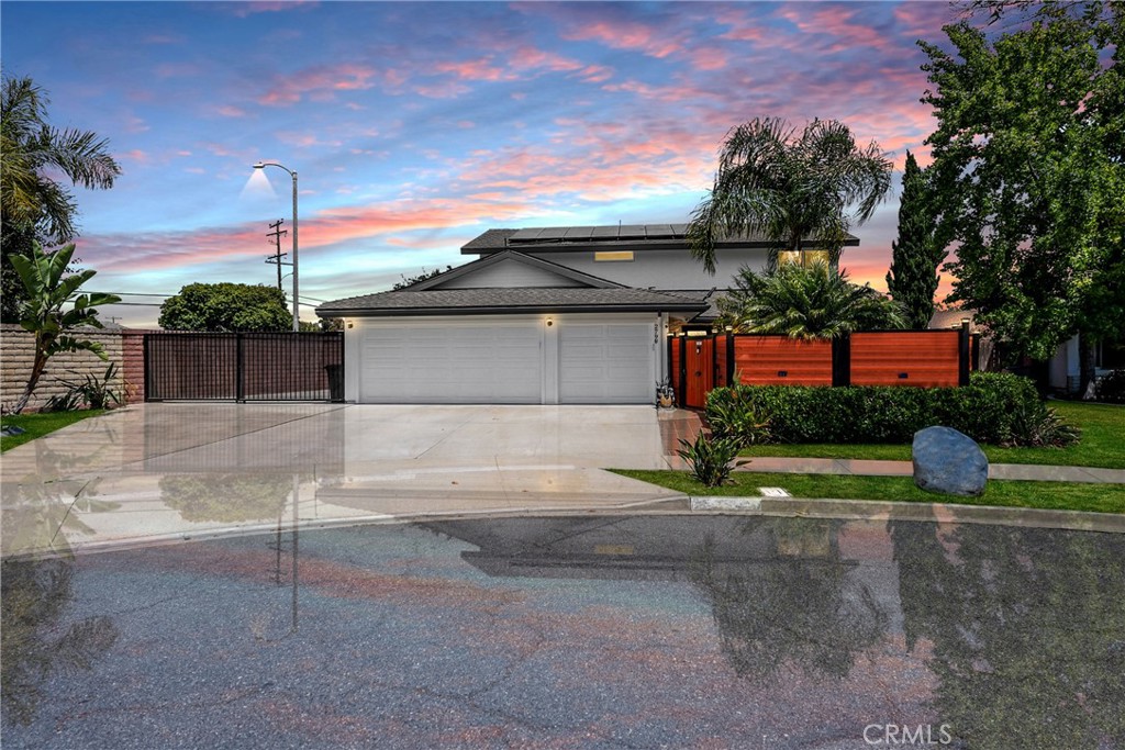 Welcome to Your Fully Renovated Tropical Oasis!
This stunning 5-bedroom, 3-bathroom single-family home in the highly sought-after Mesa Verde community has been beautifully reimagined from top to bottom—offering 2,301 square feet of modern, truly turnkey living. This home first features privacy- at the end of a cul-de-sac you only have one adjacent neighbor, and you have a beautifully redone security fence to create privacy in your new home.
Tucked away at the end of a peaceful cul-de-sac, this home is just a short stroll from the local park and Costa Mesa Golf Course, providing the perfect balance of relaxation and recreation. Step inside to discover an expansive open-concept floor plan featuring gorgeous contemporary flooring, dual stacked stone fireplaces, and abundant natural light throughout. A brand new kitchen with all brand new appliances await!
The chef’s kitchen is a true showstopper—completely remodeled with sleek stainless steel appliances, rich granite countertops, and newer custom white cabinetry. Every bathroom has been tastefully upgraded with high-end finishes, and the upstairs master suite feels like a private retreat, complete with a spa-inspired stone rain shower, dual granite vanities, and generous his-and-hers closets.
This home is designed for comfort and efficiency, with high-end upgraded dual-pane windows for peace and quiet, fresh interior and exterior paint, new landscaping, solar panels, and thoughtful touches like fountains and fruit trees that add charm to both the front and backyards. The entertainer’s backyard is a dream—featuring a built-in BBQ, tropical Tiki Bar, water misters, and lush greenery for hosting unforgettable gatherings.
Parking is never an issue here with a rare, oversized gated RV space and an extended driveway that fits all of your RV/toys behind a security gate. You'll also enjoy direct access to a spacious 3-car finished garage. With too many upgrades to list, this fully renovated home is truly move-in ready. Don’t miss the chance to own your personal slice of paradise in Mesa Verde!