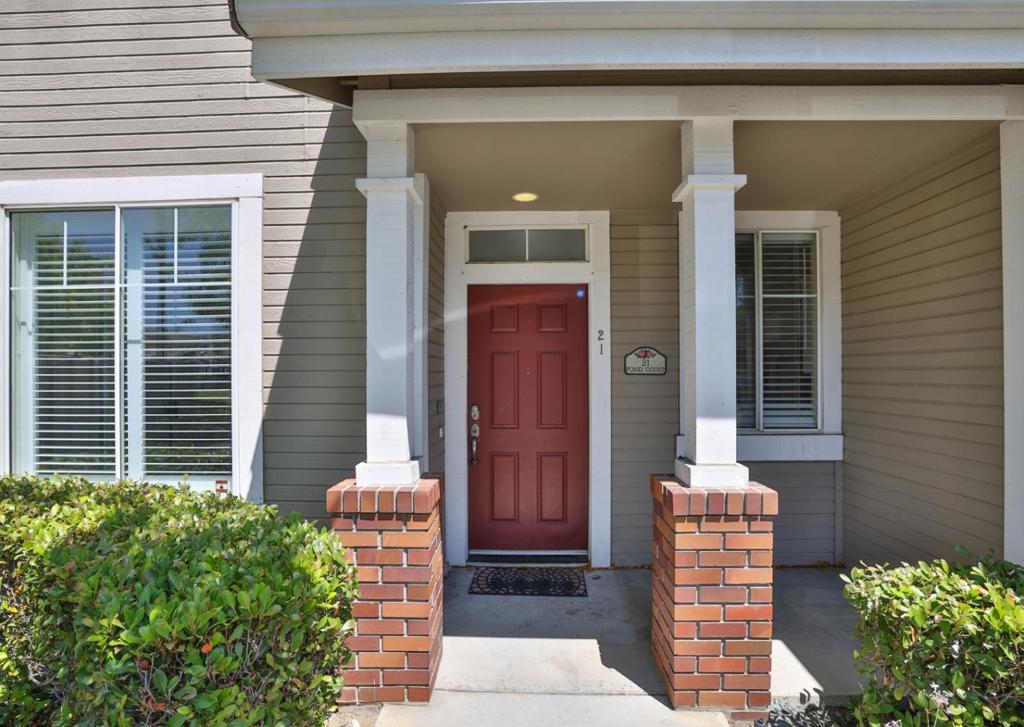 Modern comfort meets tranquil convenience in Reflections at Milpitas. This former model end-unit town-home lives large with 3 spacious bedrooms, 2.5 baths and 1,371 sqft of thoughtfully updated living space with warm hardwood floors invite you to move right in. The open main level centers on a gas-burning fireplace and custom built-in media wall, flowing to a sun-splashed dining area and a tile-accented kitchen with gas range, microwave, refrigerator and generous counter space. Sliding doors reveal a private, fully-fenced patio ringed by mature trees, perfect for morning coffee or evening BBQs. Upstairs, the primary suite boasts a walk-in closet, garden tub/shower combo and an airy built-in desk ideal for hybrid work. Practical amenities elevate daily life: inside laundry room, central A/C and heat, and an attached side-by-side 2-car garage. The Reflections HOA covers exterior maintenance, roof, landscaping, insurance and more, and offers a community playground for carefree weekends. Enjoy a peaceful lake-side stroll at nearby Hidden Lake Park, or reach Milpitas Library, Great Mall, dining and I-880/680/237 in minutes. Served by sought-after Milpitas Unified schools. 21 Pond Court delivers turnkey style, coveted privacy and unbeatable Silicon Valley access.