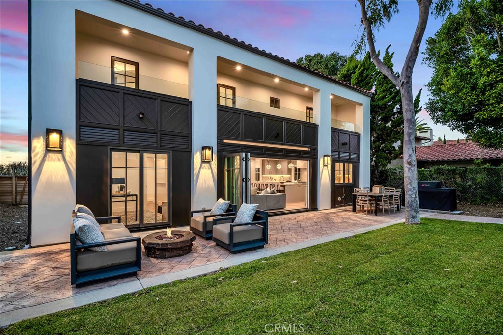 New homes or extensively remodeled homes are almost impossible to find in Palos Verdes Estates due to the lengthy, difficult permit/building process. Here is your chance to turn the key and move right in to a home where an over two million dollar remodel was just completed. Nestled on one of the most prestigious and sought after street on the Peninsula "Paseo Del Mar", this stunning residence epitomizes collaborative excellence at its finest. Every detail of this magnificent estate reflects a level of craftsmanship and artistry that is unmatched. From the meticulously crafted cabinets to the lavish tile and stone finishes, the interior exudes a bespoke luxury that is both tasteful and opulent. The seamless integration of indoor and outdoor spaces is achieved through expansive walls of glass, offering breathtaking ocean views and refreshing sea breezes from private patios. Upon arrival, guests are greeted by the grandeur of a sweeping circular driveway leading to a serene water feature and spacious patio, setting the stage for the elegance that awaits within. At the heart of the home lies the culinary haven of an elegant kitchen, seamlessly connected to the family room and sprawling backyard with a tranquil waterfall feature. The formal dining room is adorned with a stunning Jamie Young chandelier, while the great room, boasting a wet bar and striking fireplace, extends gracefully to the patio, ideal for entertaining guests. The primary suite is a luxurious sanctuary with ocean vistas, a private patio, and an expansive bath leading to a dream walk-in closet. Three additional bedrooms, each with patio access, grace the upper level, while a fifth bedroom or office is conveniently situated downstairs. A versatile 507-square-foot bonus room offers endless possibilities and can easily be converted into an exceptional ADU (Accessory Dwelling Unit). Additionally, a discreet 252-square-foot wine room area caters to the connoisseur's palate. Practicality meets luxury with three-car garage and an additional parking space accessible via a convenient alley behind the residence. Meticulously reimagined from its foundation upward, this home showcases the pinnacle of luxury living with the finest materials and craftsmanship, making it a true masterpiece. Room for pool/spa by backyard or keep the spacious lawn and patio area. The City of PVE offers the Palos Verdes Golf & Tennis Club and Palos Verdes Beach & Athletic Club with pool for residents to join and enjoy!