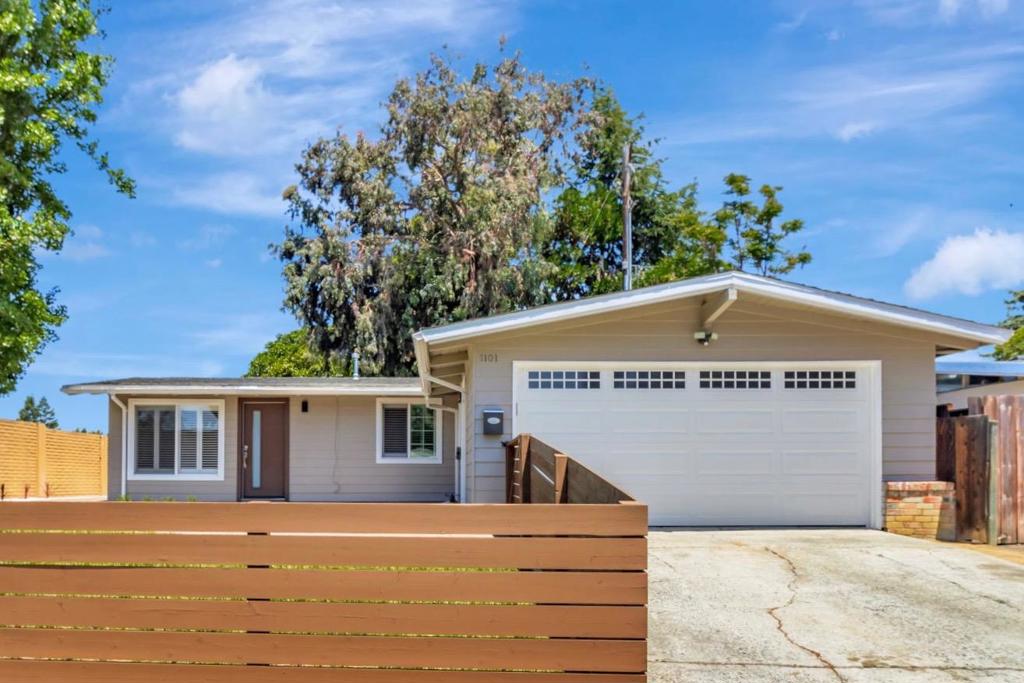 Modern style meets classic design in this beautifully updated mid-century modern home in desirable Sunnyvale location! This 3-bedroom, 2-bath gem features a newly remodeled kitchen with white shaker cabinets, quartz countertops, and stainless steel appliances, along with freshly updated bathrooms showcasing modern finishes. Dual-paned windows and plantation shutters provide style, efficiency, and privacy. The open layout is filled with natural light, and the finished, insulated garage offers a versatile flex space perfect for an office, gym, or studio. Enjoy a backyard oasis and a private front yard enhanced by a sound wall that provides a peaceful buffer from Lawrence Expressway. Perfectly located in the heart of Silicon Valley, this home is just minutes from major tech campuses (Google, Apple, Amazon, and more), top-rated dining, shopping, parks, and Levis Stadium.