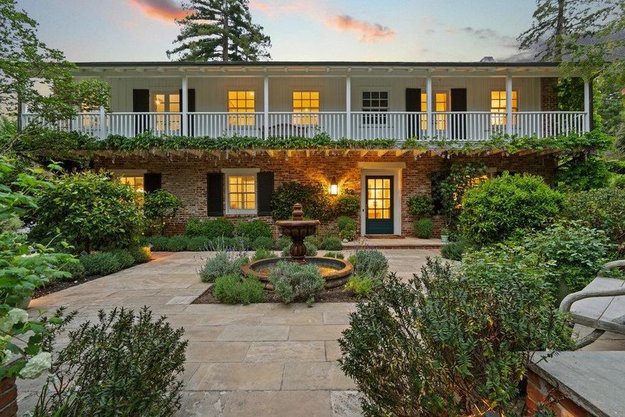 Experience luxury in this exquisite 4,010 sq ft residence nestled in prestigious lower Hillsborough. Situated on a sprawling 16,837 sq ft lot, boasting 5 beds, 3.5 baths. Upstairs, discover 4 generously sized bedrooms, including a grand primary suite with balcony access. The ground floor offers a convenient bedroom suite for in-laws or an au pair. The heart of the home is a stunning chef's kitchen with modern stainless-steel appliances, overlooking a serene backyard oasis featuring a lap pool, BBQ area, vegetable garden, citrus trees, and ample seating perfect for entertaining. Adjacent to the kitchen is a spacious family room with fireplace and wet bar. Additional features include a formal dining room, inviting living room with fireplace, 2-car garage, charming courtyard, and gated entry. A rare opportunity awaits discerning homeowners, where timeless elegance meets modern luxury living.