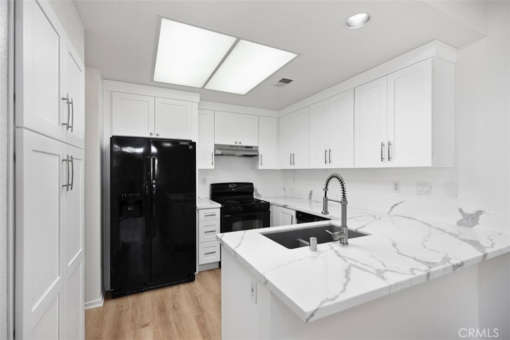 One of the most appealing aspects of this condo is its location. Nestled in a friendly neighborhood, residents have access to a variety of local amenities, including shopping, dining, parks, and recreational activities. On the first floor gated courtyard leads to a spacious living and dining room area in this 1 bedroom, 1 bath condo. Generous size kitchen with plentiful cabinet and counter space. Mirrored wardrobe doors in master bedroom with private bath which features large, duel vanity sinks. Washer, dryer and refrigerator are included in this condo with assigned carport and community pool. Excellent location in Rancho Santa Margarita close to shopping centers, Monte Vista Park and in the Saddleback Valley School District. Aside from that, you will also have an access to all the SAMLARC amenities!