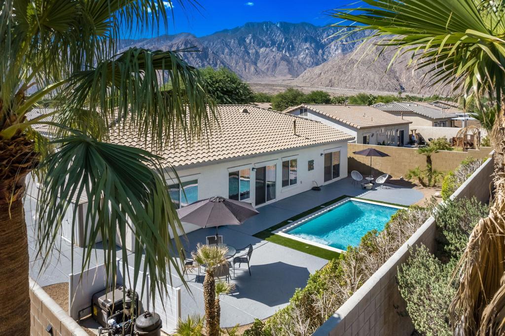 Your Palm Springs dream home is here! This stylish 4-bedroom, 3-bath home with a private casita, saltwater pool, and RV parking blends modern updates with mid-century character.The kitchen features quartz countertops, a waterfall island, KitchenAid appliances, a wine bar, and dual pantries. Bathrooms are finished with custom tilework and quality fixtures for a clean, timeless look.Step into your private backyard for poolside relaxation or enjoy the Mountain Gate community amenities--pools and spas, tennis and basketball courts, plus picnic and BBQ areas--all for just $160/month HOA, and you own the land.Don't miss your chance to own this Palm Springs retreat--schedule your showing today!