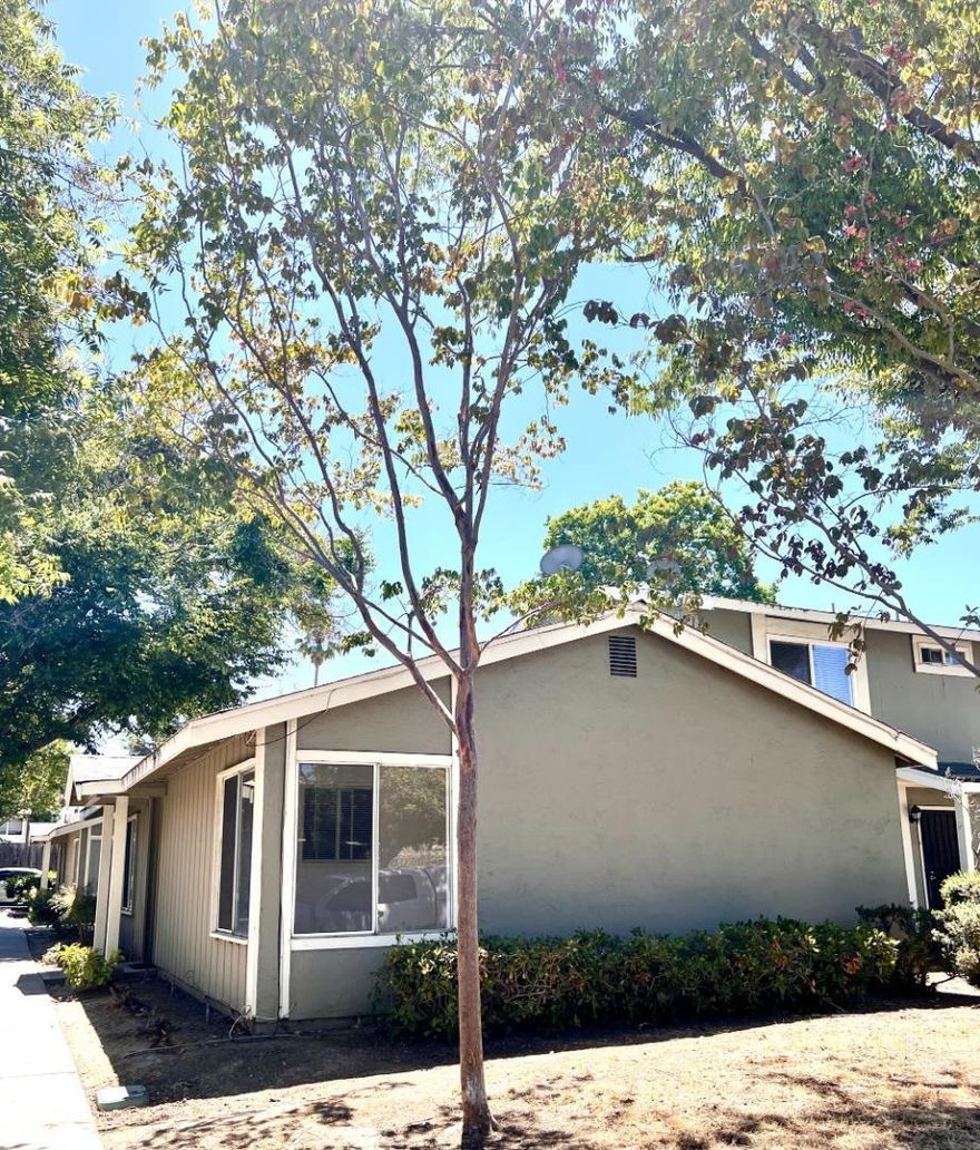 Welcome to 1362 McQuesten Drive #A and this cozy 2 bedroom 1 bath single level ground level condominium home encompassing 888 SF. Enter to a light filled spacious main room that is highlighted by hardwood flooring that continues into the 2 bedrooms. Dine in kitchen features include granite countertops, brand new electric cook top/oven and refrigerator amid stained wood cabinetry. One bedroom is currently divided into 2 rooms creating 3rd bedroom/office/playroom possibilities. A deep one car assigned attached garage and community laundry facilities are included. Enjoy outdoor activities in your attached fenced in private back yard. This home lives much like a single family detached house as privacy and sound insulation is enhanced with only one partial common wall. Convenient commute corridors including Highways 280/680 and 101 are minutes away. Welcome home !
