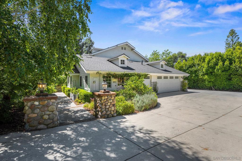 Escape the ordinary and come home to charm, comfort, and space in this beautifully designed 5 bedroom, 3 bath modern farmhouse nestled on just under an acre of lush, landscaped land! Step inside to discover a warm and inviting floor plan with distinct living spaces that offer flexibility and privacy. The kitchen is well-appointed with modern features, while the separate dining and living areas create a cozy, functional flow ideal for both quiet evenings and entertaining. Outside, is where this home truly shines! Enjoy the benefits of a fully functional chicken coop to collect farm fresh eggs and harvest your own produce from a well-established mix of over 20 mature fruit trees and vegetable gardens. The beautifully landscaped yard is a nature lover’s paradise, with a wide variety of vegetation creating a peaceful, park-like atmosphere. Whether you're sipping coffee on the patio, gathering fresh eggs in the morning, hosting alfresco dinners in the beautiful pergola, tending to your garden or kicking off a family soccer game in the large grassy yard, this property offers the perfect blend of modern living and country charm for a family. Key features: • 5 Bedrooms / 3 Full Baths • New Carpeting • Roof was replaced in the past year • Mature fruit trees, vegetable beds, and edible landscaping • Peaceful, private setting with plenty of room to roam Don’t miss your chance to own this unique slice of paradise. Schedule your private showing today!