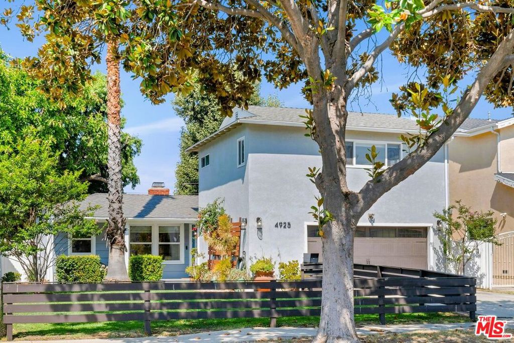 To borrow a line from Goldilocks . . . . "This one is just right." Create your own fairy tale in this thoughtfully updated and expanded Sherman Oaks home located on a quiet tree-lined block in a friendly neighborhood. This light and bright home is neither too big nor too small. It isn't just another hastily built "modern farmhouse" nor is it an old bungalow in serious need of updating. This home is just right. Over the years, the home has been tastefully remodeled and expanded to meet today's modern living standards. You can look forward to preparing meals for friends and family in the chef's kitchen that opens to the family and dining rooms. Enjoy your morning coffee on the front porch or after a long day you can relax with a glass of wine around the fire-pit in the back yard. Recent upgrades include a first-floor expansion that created 3 large bedrooms, 2 new bathrooms, plus an office/play-room. Upstairs is dedicated to a large primary suite with sitting area, walk-in closet and luxurious bath with soaking tub. The family room has walls of glass that open to the backyard where you can host an intimate al-fresco dinner party or throw an end-of-summer BBQ. Both kids and pets will truly love running around this huge fenced in space. The home is perfectly located close to the best shopping, dining and nightlife around. While at the same time, it is in the middle of a close-knit neighborhood where people know their neighbors, kids ride bikes to their friend's houses around the corner, and you can take the sidewalk to Friday Night Lights at Notre Dame High School. Come start writing your "Once upon a time . . . ."