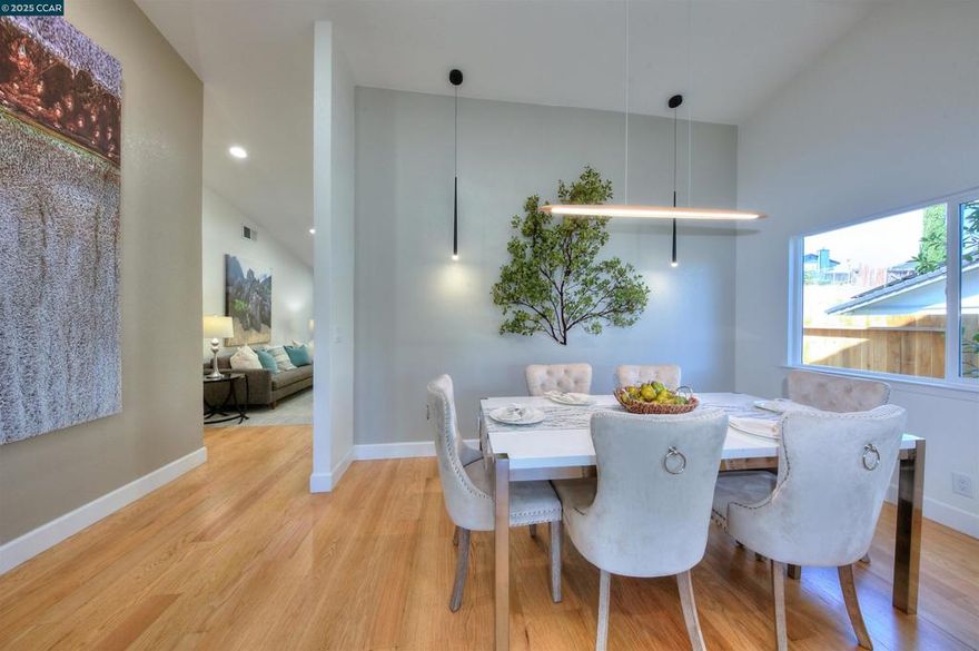 Nestled in the heart of Hercules, this beautifully renovated 3BR, 2BA home offers comfort, style, and convenience. The Family Room showcases a stunning porcelain-slab Fireplace framed by gleaming hardwood floors, all-new Windows, and updated Lighting. The brand-new Kitchen is equipped with custom Euro-Cabinets, Quartz Countertops, a stainless steel single-bowl Sink, and premium Appliances, perfect for everyday living and entertaining. Both Bathrooms have been fully renovated with designer finishes, including Quartz vanities and modern fixtures. The spacious Primary Suite features an updated Bath and walk-in closet, while two additional Bedrooms offer flexibility for guests or a home office. Central A/C provides year-round comfort, and sliding doors open to the Backyard, an inviting space for gardening, BBQs, or relaxing outdoors. Close to schools, shops, and restaurants, the home is part of the vibrant and diverse City of Hercules, “A Place We Call Home.” Nearby are Refugio Valley Park, the Swim & Recreation Center, Dog Park, Teen Center, Public Library. The proposed Intermodal Regional Transit Ctr at the Waterfront THE HUB connects Train, Bus & future Ferry service, adding to the city’s convenience and growth. Move-in ready and beautifully upgraded.