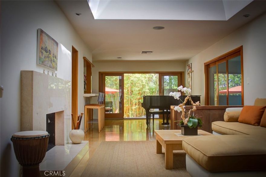 Exceptional Japanese Modern home offering serene indoor outdoor living in the heart of Venice Beach. This sun filled, solar powered residence sits on a private walled lot creating a peaceful sanctuary while minutes from world class shopping, dining, and beach access. An entertainer's paradise. Interior features include newly installed central heat and AC with advanced air filtration system, a spacious gourmet kitchen with modern appliances and wine refrigerator, a dedicated media or screening room with reclining Natuzzi seating (this is the 3rd bedroom but could be converted to sleeping bedroom), smart home technology with streaming capable TVs throughout, a master suite with Duxiana mattress and spa inspired design, and a deep soaking tub for ultimate relaxation. Outdoor living highlights include an expansive mangaris wood deck with multiple entertainment zones, a private hot tub with ozone sanitation system, a built in gas BBQ grill and fire pit area, teak dining furniture with shade umbrella, tranquil water features and Japanese inspired landscaping, and a meditation garden with zero gravity relaxation seating. Location benefits include an easy bike ride to Venice Beach, Abbot Kinney Boulevard, and Whole Foods, a prime Venice location that combines privacy with walkability, and high speed internet included. Additional notes: fully furnished and turnkey ready, previously operated as a successful short term rental with all amenities and supplies included.