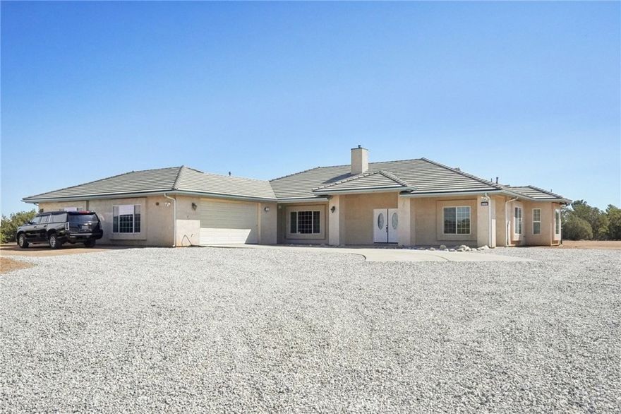 Private Home on Expansive Lot!

Don’t miss this rare chance to own a stunning private home situated on over 98,000 sq ft of land, offering unmatched seclusion, incredible space, and endless possibilities.Built in 2006 with a durable tile roof, this property blends modern comfort with room to grow. Inside, you’ll find beautiful tile floors throughout, a spacious open-concept kitchen perfect for entertaining, a cozy TV room for relaxing evenings, and a large office/den that can easily serve as a fourth bedroom, guest suite, or creative studio.The true highlight of this property is the super oversized garage—a dream space that fits up to 4 cars plus a dedicated work area. Whether you’re a car collector, RV owner, boat enthusiast, or simply in need of a massive workshop or storage solution, this garage provides limitless opportunities to customize to your needs.Whether you’re looking for privacy, room to expand, or the ultimate hobby space, this one-of-a-kind property checks all the boxes. Schedule your showing today and explore the incredible potential this home has to offer!