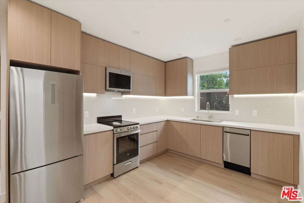 Be the first to live in this brand-new luxury 2-bedroom, 2-bath ADU in Sherman Oaks! This modern single-story residence features an open-concept layout with a chef's kitchen complete with an oversized island, sleek cabinetry, and high-end finishes. Enjoy seamless indoor-outdoor living with a spacious private front patio bathed in natural light perfect for entertaining or relaxing. Thoughtfully designed for comfort and style, the home includes in-unit laundry, ample storage, with a private, fenced in access straight to the unit. Nestled in a newly built 4-unit community, the ADU blends contemporary design with everyday functionality in one of the Valley's most desirable neighborhoods. Bonus: Landlord is offering 1 Month Free Rent for approved applicants don't miss this rare opportunity!
