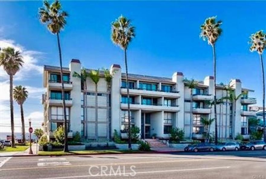 This spacious condominium is located just 1 block to the beach where you can surf with the dolphins, enjoy the pristine sandy beach, ride along the bike path, and view some spectaculars sunsets! Features include engineered mahogany floors throughout, a cozy fireplace in the living room, inside laundry with newer washer and dryer, and a private patio. On the main floor you have one bedroom overlooking the lovely landscaped courtyard; and, upstairs there is a loft primary suite with a large walk-in closet, and office/den area with ceiling fan. Also included are 2 parking spaces (tandem), and a storage cabinet in the gated garage. A short distance from the Riviera Village, you will find shops, restaurants for fine dining, and sidewalk cafes! Enjoy the gorgeous Pacific Ocean and bike path to the Renowned Redondo Beach Pier, Harbor and beyond!