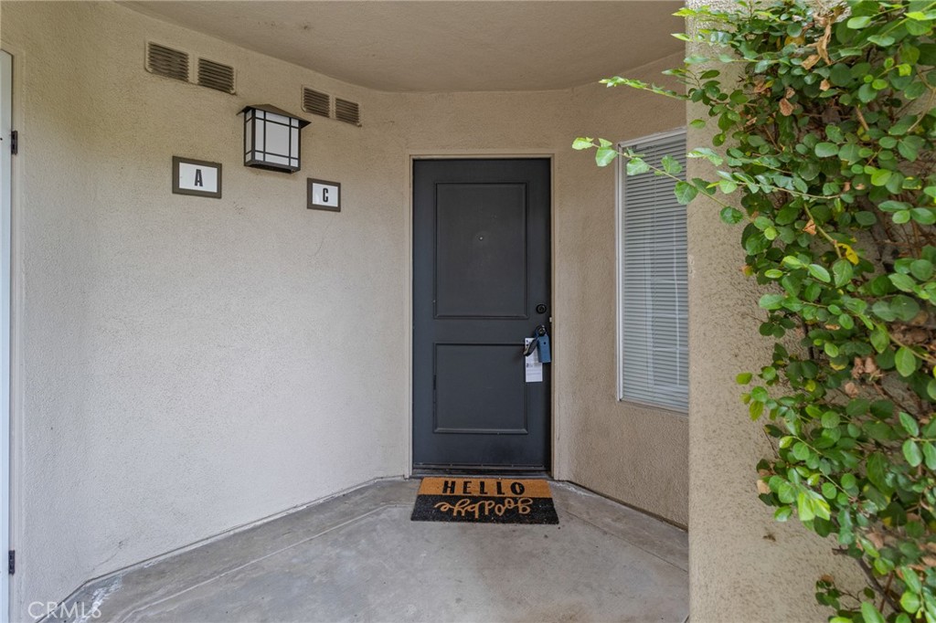 UPGRADED CONDO IN THE DESIRABLE COMMUNITY OF CANYON HILLS! Step inside and will immediately notice how open the main living space feels. Features include Wood-style flooring and recessed lighting throughout. The kitchen is upgraded with stainless steel appliances, a built-in microwave, and modern-looking cabinets with plenty of storage. The kitchen is connected to the dining and living area, with the living area having direct access to your outdoor patio space, perfect for when entertaining guests. The bedroom also has access to outdoor patio space, along with its own bathroom and walk-in closet. Washer and Dryer stackable hookups. Detached single car garage. The community provides access to a pool and spa. Located a short distance from Peter Canyon Regional Park. Easy access to the toll road and Jamboree.