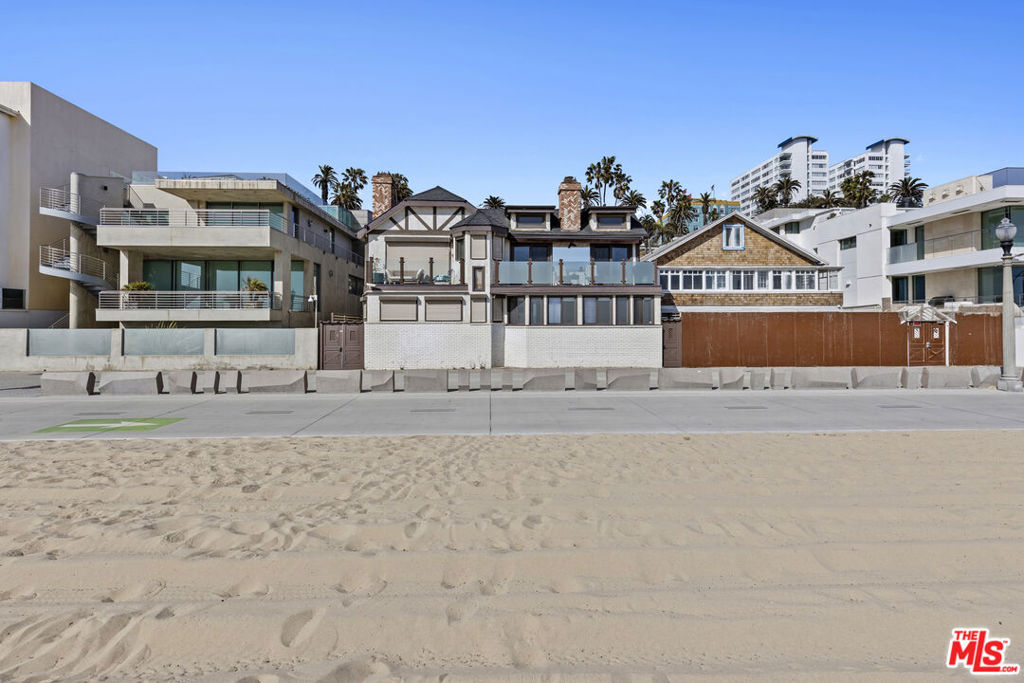 A rare find, this detached beach townhouse offers privacy and feel of a single-family home, with direct access to the beach. Beautifully remodeled, the 2-bedroom, 2-bathroom residence is airy, clean and loft-like, with high ceilings and great natural light throughout. Thoughtfully designed with a built-in desk, cozy fireplace, a large primary bathroom with dual vanity and walk-in shower, a separate loft creative space and extensive built-in cabinetry for generous storage with the kitchen featuring Jenn-Air stainless steel appliances. Enjoy the convenience of a private two-car garage with direct access to your home, low HOA dues and prime location just minutes from downtown Santa Monica.