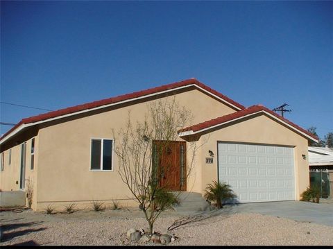 Photo of 378 West Rosa Parks Road, Palm Springs, CA 92262 (MLS # OC26035657)