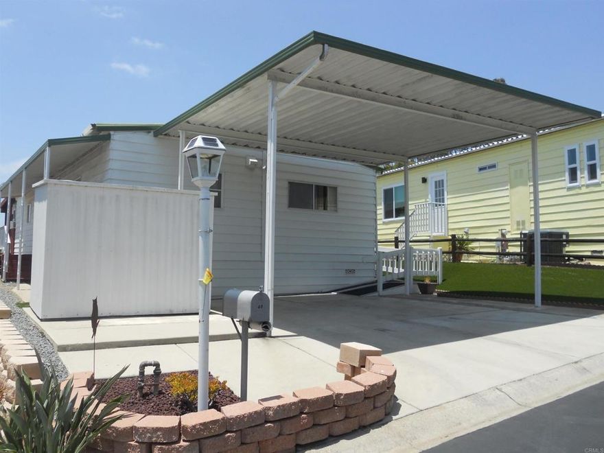 Escondido’s Hidden Gem – An Exclusive 55+ Community – Welcome to Villa Madeira! "A 55 and older community" Discover the charm of Villa Madeira, Escondido’s best-kept secret, where adult living reaches its finest expression. This beautifully maintained single-level manufactured home offers approximately 1,200 sq. ft. of comfortable and functional living space, featuring 2 spacious bedrooms, 2 full baths, a cozy family room, light-filled sunroom, and a bright eat-in kitchen with a separate dining area. A dedicated laundry room adds everyday convenience. Enjoy seamless access with a gently sloped ramp leading from the two-car covered carport right to your front door. Just steps away, the inviting community clubhouse and sparkling pool provide the perfect setting for  relaxation and social connection. Ideally located near shopping, dining, entertainment, and medical facilities, this home offers both tranquility and convenience. Probate Sale – Property to be sold in its present “as is” condition.