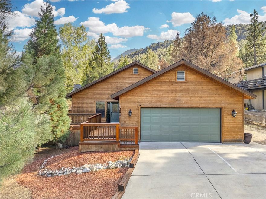 Escape to your perfect mountain sanctuary in the highly desirable Pine Mountain Club (PMCPOA) community. This beautifully updated, move-in-ready home offers a blend of rustic charm and modern convenience, providing the ultimate year-round retreat.



This spacious residence features 3 bedrooms and 2 bathrooms, encompassing 1,827 sq. ft. of living space on a generous 10,412 sq. ft. lot. The interior boasts an open-concept living area with soaring vaulted wood-plank ceilings and rich wood flooring, creating a warm and inviting atmosphere. The gourmet kitchen is a chef's dream, complete with butcher block countertops, bright white cabinetry, and a full suite of stainless steel appliances—including the refrigerator, dishwasher, and microwave, all of which are included. The home also comes equipped with the washer and dryer in a dedicated laundry room.



Step outside to embrace the natural beauty of the area. The property offers stunning mountain views and features a spacious deck, perfect for outdoor dining and entertaining. The large, private backyard is ready for your vision, complete with a greenhouse with potential for gardening enthusiasts. The property also includes a convenient two-car garage.



Living in PMCPOA provides a hassle-free lifestyle with essential year-round services, including 24/7 security patrol, trash and recycling collection, road maintenance, and snow removal. For added peace of mind, Kern County Fire Station 58—staffed with paramedics and equipped with a helipad—is located within the community, ensuring prompt emergency response when needed.



Blending custom comfort, excellent community amenities, and the breathtaking natural beauty of Pine Mountain Club, this home is a must-see. Don't miss it, schedule your showing today!