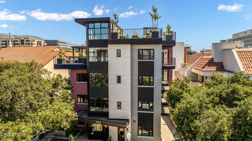Stunning New Condo in Pasadena's Vibrant Playhouse Village...Welcome to your modern retreat in the heart of Pasadena. This brand-new, luxury condominium blends sophisticated design, quality finishes, and unbeatable location for an elevated urban lifestyle.Step inside to discover an open-concept living area filled with natural light, designer recessed lighting, and wide-plank wood floors that flow seamlessly throughout. The gourmet kitchen features sleek wood-grain cabinetry, premium stainless-steel appliances, quartz countertops, and a full-height backsplash--perfect for cooking and entertaining in style.The primary bedroom suite treats one to a calm, beautiful space complete with oversized windows, custom lighting, and a spacious closet, complemented by a bath en suite. The spa-inspired bathrooms impress with gorgeous vanities that flaunt modern fixtures, quartz counters and elegant large-format porcelain tile.You'll appreciate the private patio--ideal for morning coffee or evening relaxation, but don't miss the spectacular 5th floor rooftop deck featuring multiple lounge areas, lush planters, and a built-in BBQ and fire pit for ultimate ambiance to match the panoramic city and mountain views.Developed by a local builder with a strong track record of creating exceptional condominiums throughout Pasadena, Midtown Condos reflects a deep commitment to quality and community.NOTE: renderings and video depict a similar unit but are NOT photos of the exact unit.
