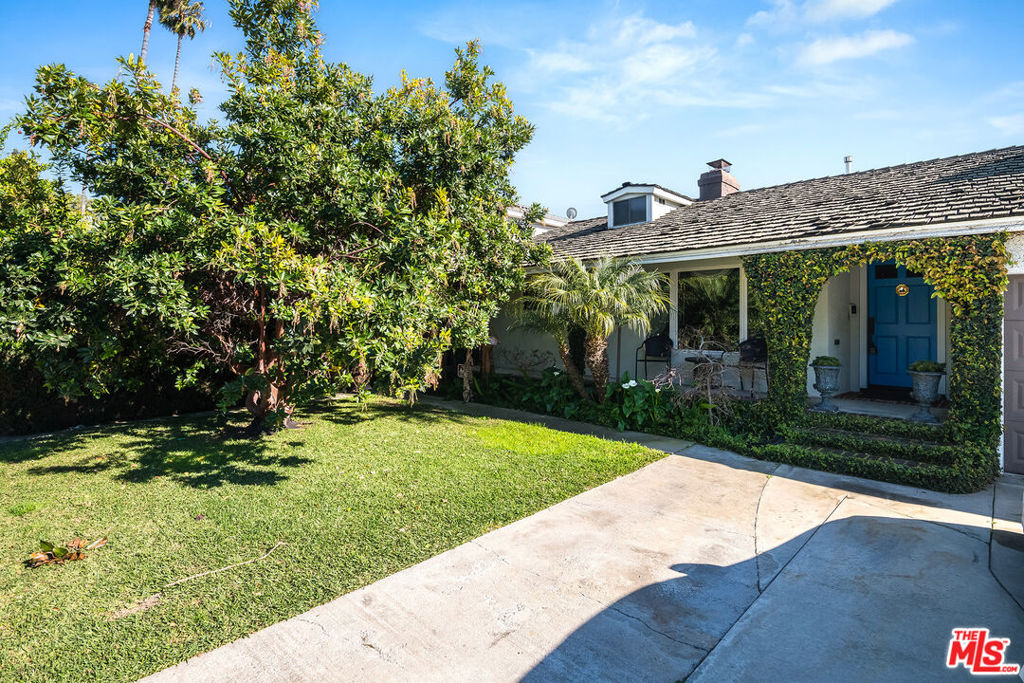 Heart of Toluca Lake Upgraded Ranch. Great open floor plan for family and working from home with three bedrooms and three full bathrooms 1611 sq. ft. single level. Recently improved including beautiful hardwood floors throughout, electric and plumbing. French doors transition fireside living room to great room and kitchen with updated cabinets, breakfast bar and stainless steel appliances. French doors open to large entertainer's deck, patio and grassy backyard. Room for pool! Set on 6169 sq. ft. lot. Laundry and HVAC. Family-friendly neighborhood close to Toluca Village, "cool" shops to explore, restaurants and recreation. Convenient to major studios.