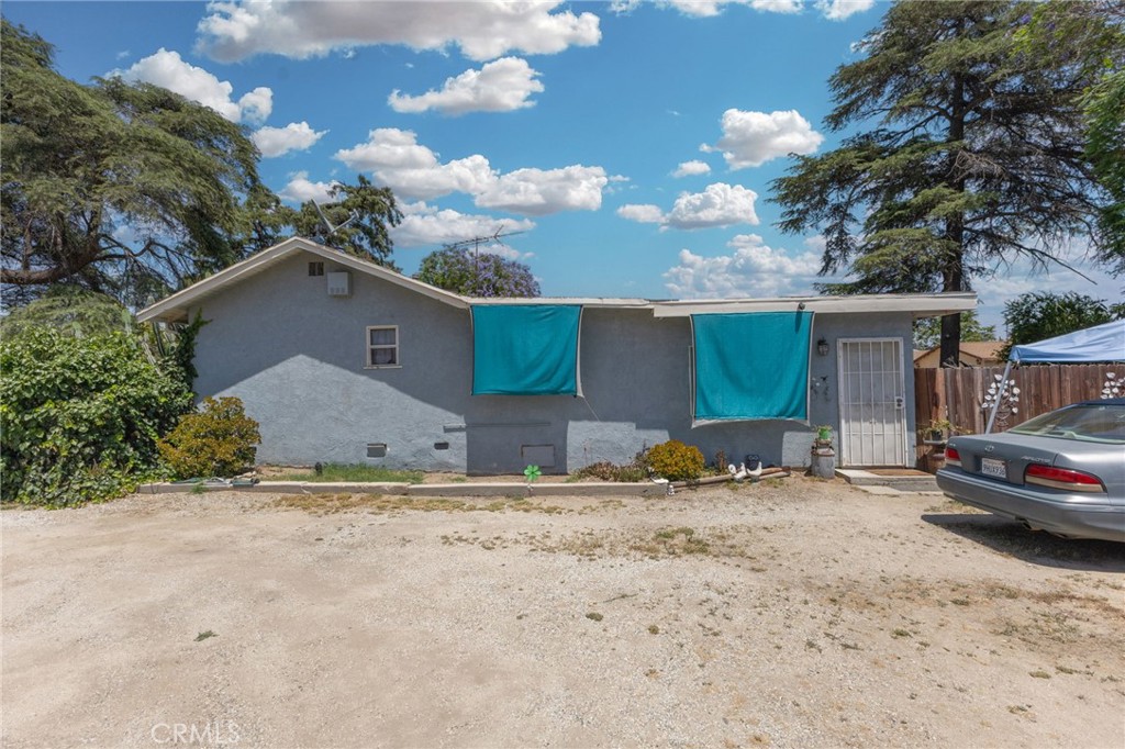 Nestled on an expansive 39,060 sq. ft. lot, this cozy 2-bedroom, 1-bathroom home at 17813 Laurel Drive in Fontana offers a unique opportunity for those with vision. The garage has been converted, adding extra versatility to the space. The home features a functional layout and classic character, ready for a creative touch or thoughtful updates. Whether you're looking to renovate, expand, or build new, the generous outdoor space provides ample room to bring your dream to life. Located in a peaceful setting with room to grow, this property is perfect for anyone seeking a quiet retreat with the freedom to make it their own.