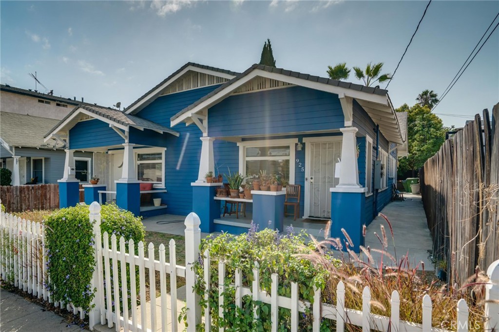 This charming 1918 Craftsman-style duplex offers the perfect opportunity for both investors and owner-users alike. Each unit features 1 bedroom and 1 bathroom, with one unit currently vacant and move-in ready. The vacant unit showcases new laminate flooring, fresh paint, canned lighting, and a newer refrigerator, blending modern updates with timeless character. The occupied unit features a remodeled bathroom with a new vanity, floors, bathtub tile, fixtures, toilet, and fresh paint. The exterior of the building was repainted six years ago and includes security gates on the side for added peace of mind. A large, gated backyard offers private outdoor space and additional potential. Enjoy the appeal of original architectural details while living in or leasing out a well-maintained property in a desirable location. The property is also very walkable to downtown San Pedro, J Trani's restaurant, and West Harbor, San Pedro's exciting new waterfront development. With one unit available for immediate occupancy, this is an ideal setup for generating rental income while enjoying the benefits of homeownership.