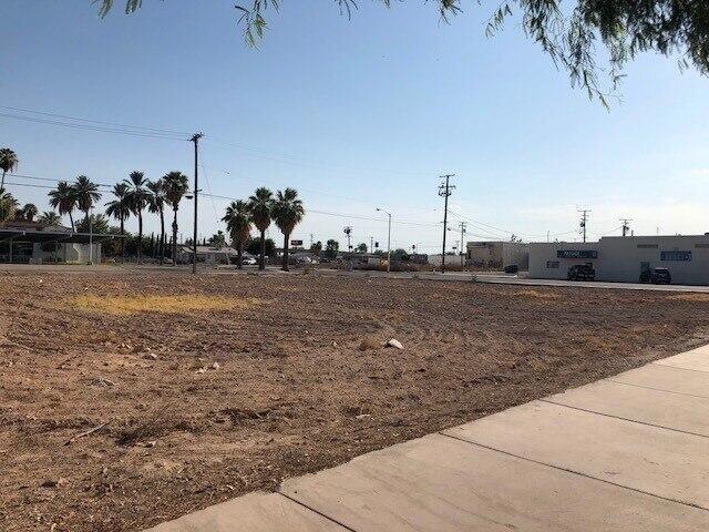 Buy separate or buy together!! 132,140,142 W Hobsonway Blythe Ca NOW offered at $425,000 all together or sold separately at $175,000 a parcel. Amazing Location: Downtown Blythe, Ca right next door to Union Bank. 3 Commercial lots approx. .54 acres all together. Utilities readily available. Property is located on the corner of Hobsonway & Spring St.